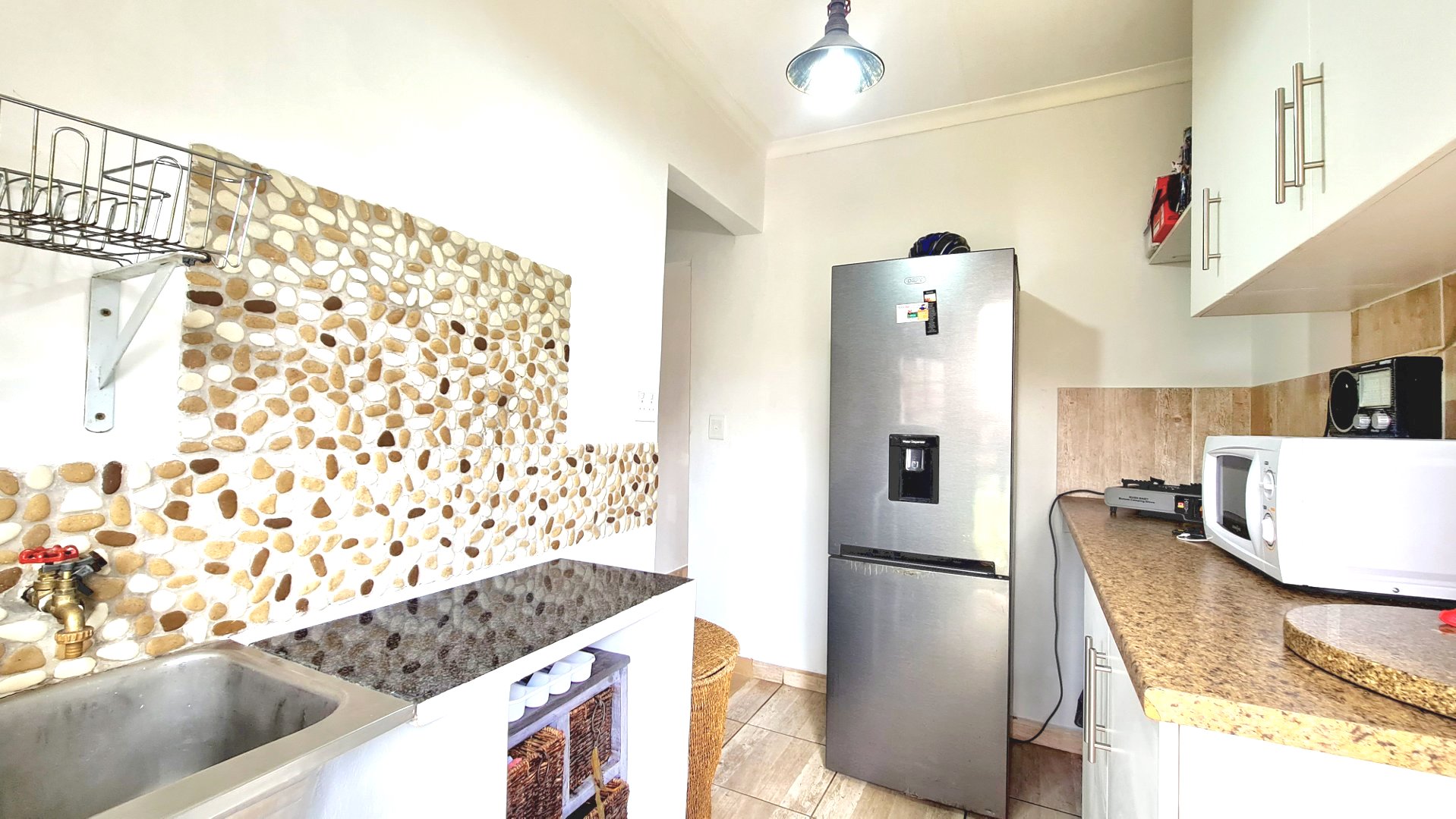 Three bedroom house with two flatlets for sale