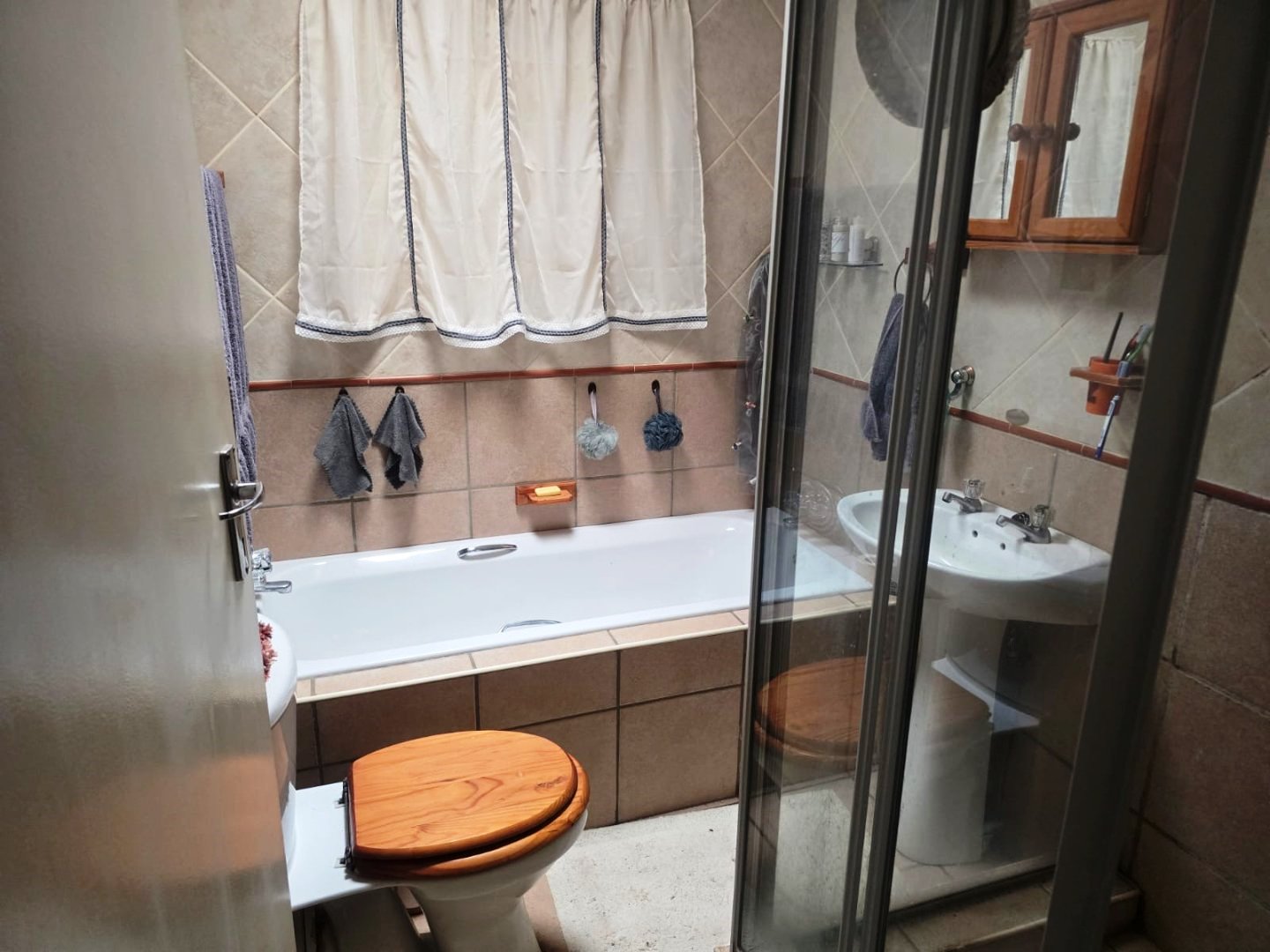 Three bedroom with bachelor flat for sale